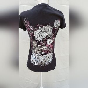 Next level Apparel Black short sleeve top with fuschia design on back. Size L